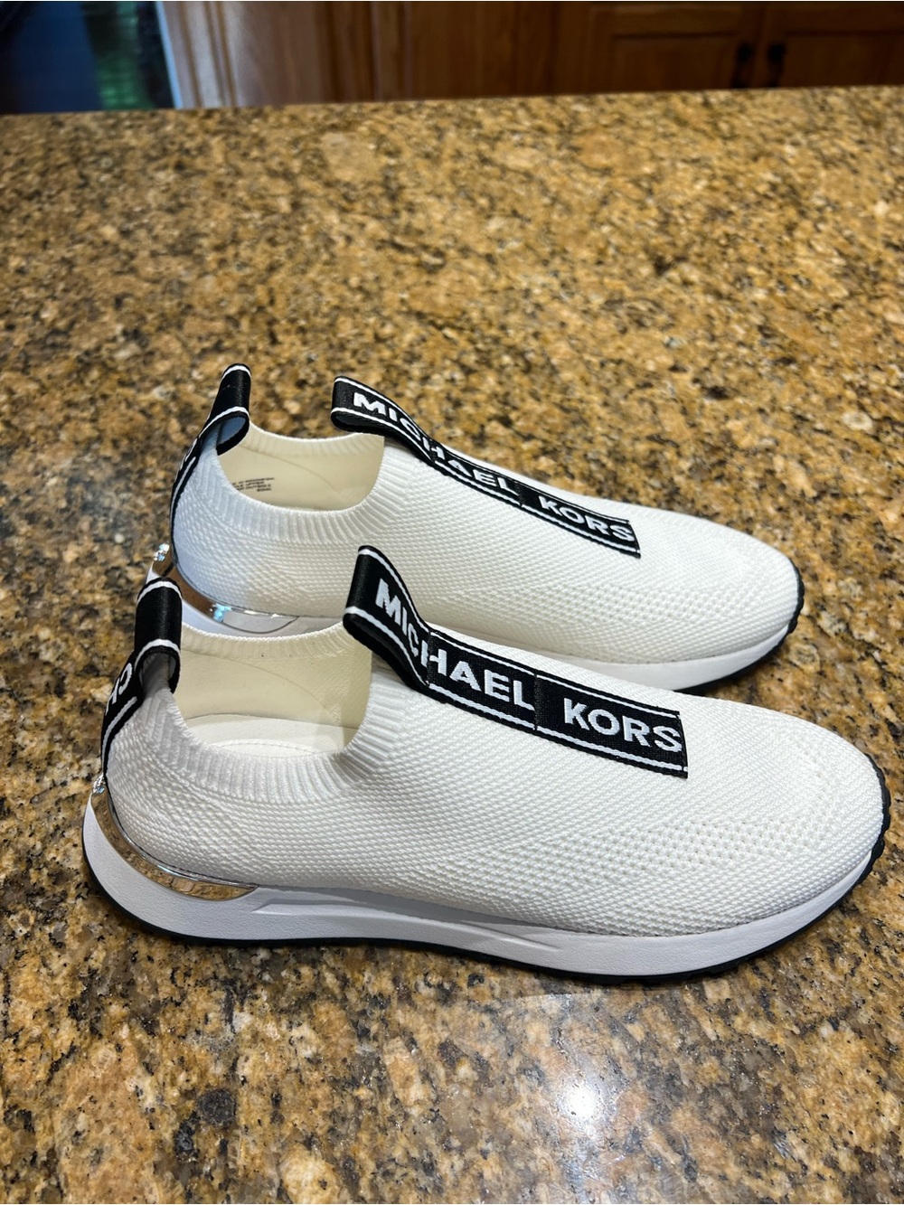 Michael Kors White Slip-On Knit Sneakers with Black Branding - Picture 3 of 9